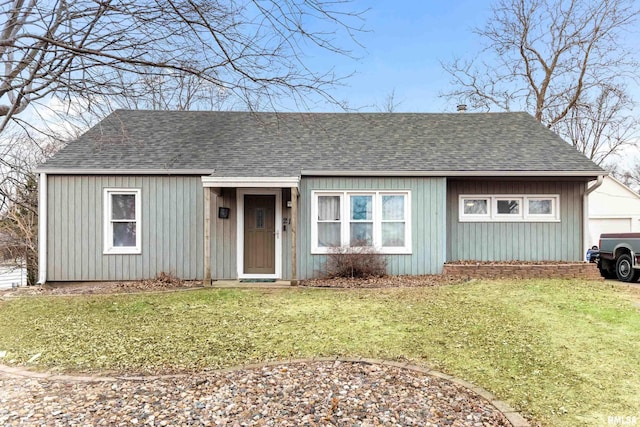 ranch-style house featuring a front yard