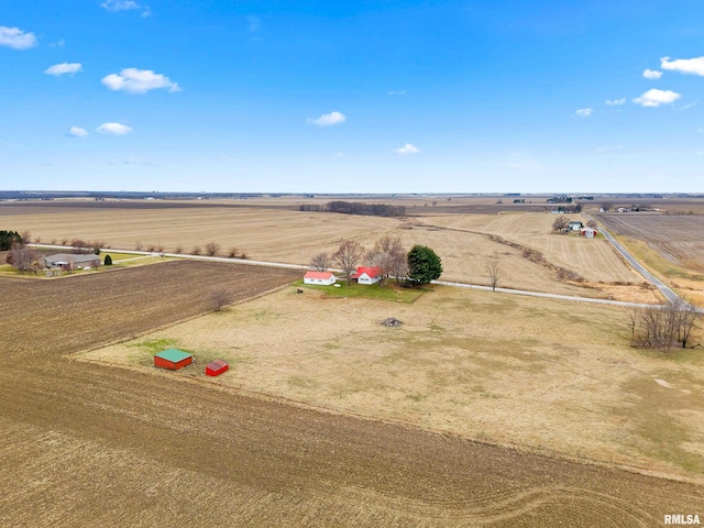 birds eye view of property featuring a rural view