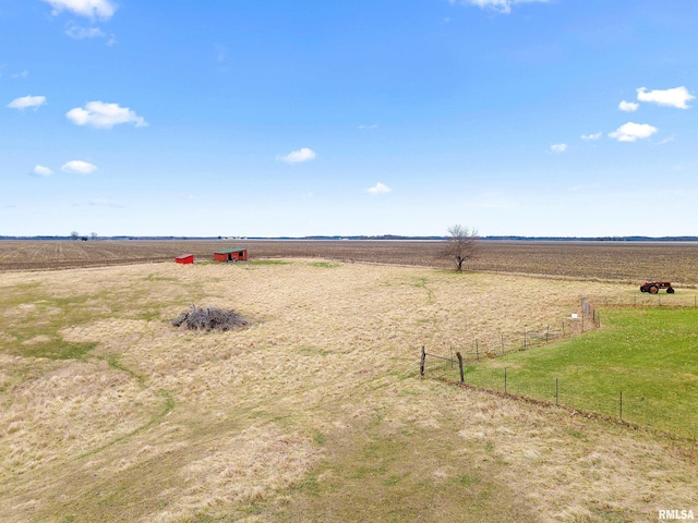 view of yard with a rural view