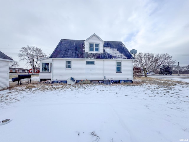 view of snow covered house