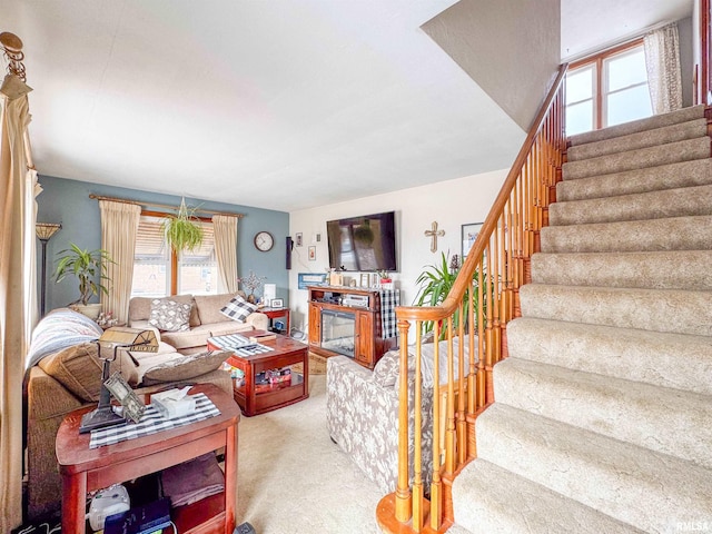 living room with light colored carpet