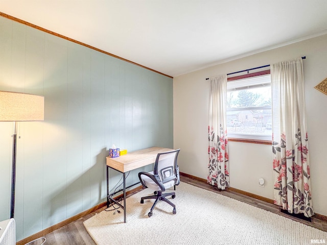 home office with hardwood / wood-style floors