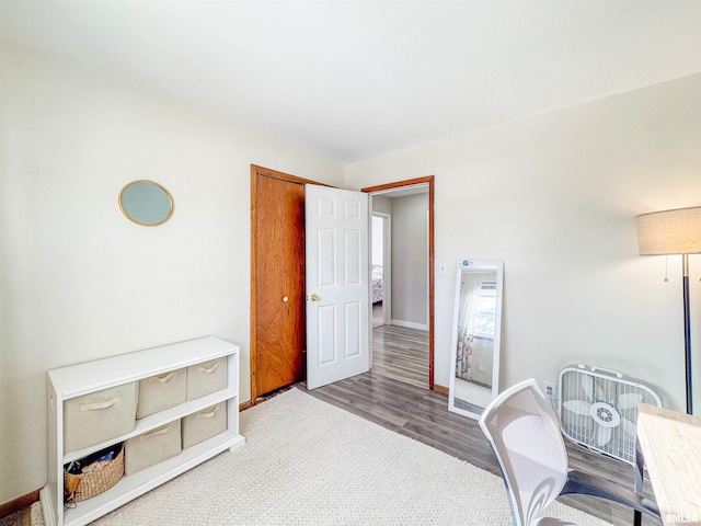 home office featuring hardwood / wood-style flooring