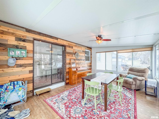 sunroom / solarium with ceiling fan