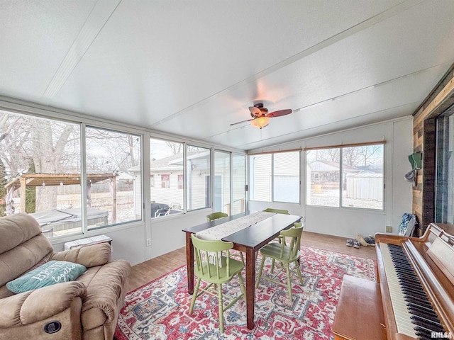 sunroom / solarium with ceiling fan