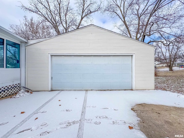 view of snow covered garage