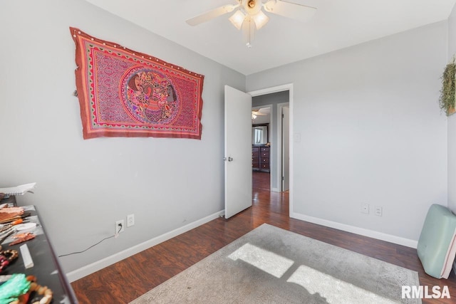 bedroom with dark wood-type flooring and ceiling fan