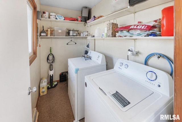 laundry room featuring washer and clothes dryer