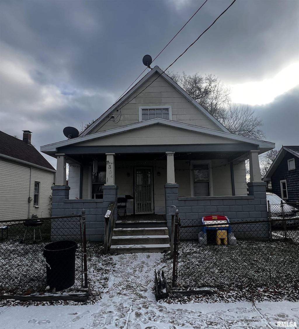 bungalow-style home with covered porch