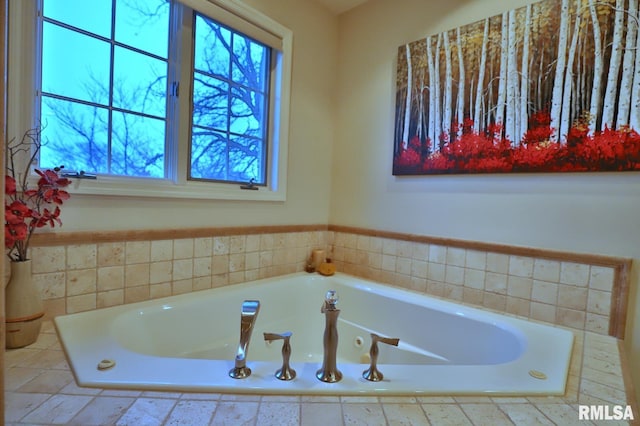 bathroom featuring tiled bath