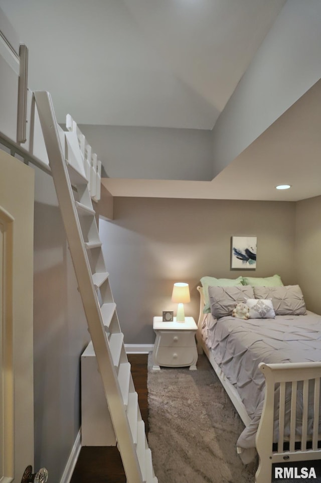 bedroom featuring dark hardwood / wood-style floors