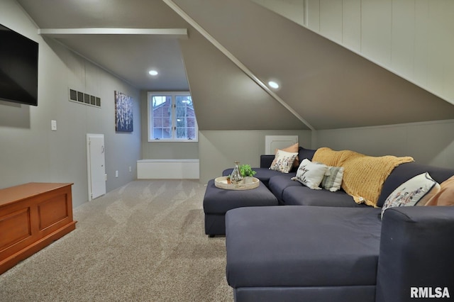 living room with vaulted ceiling and carpet