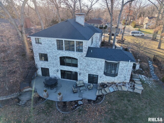 back of house featuring a patio area