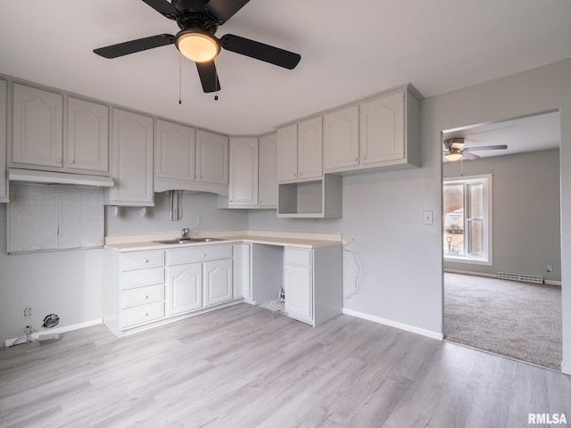 kitchen featuring sink and light hardwood / wood-style floors