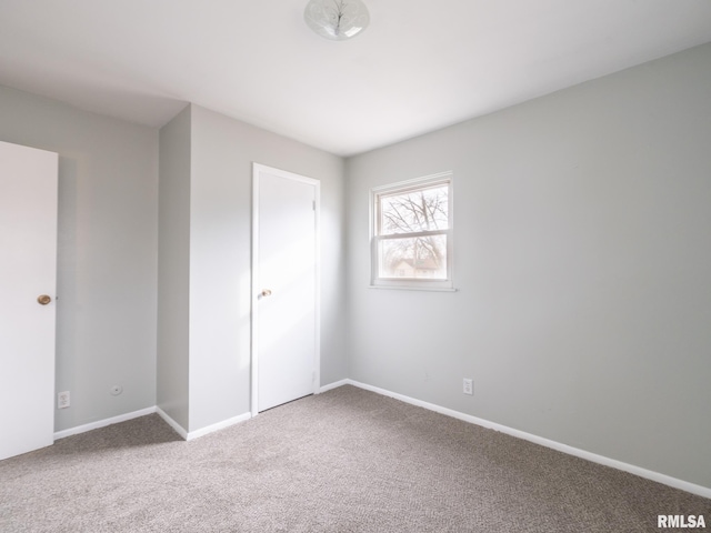 unfurnished bedroom featuring carpet flooring