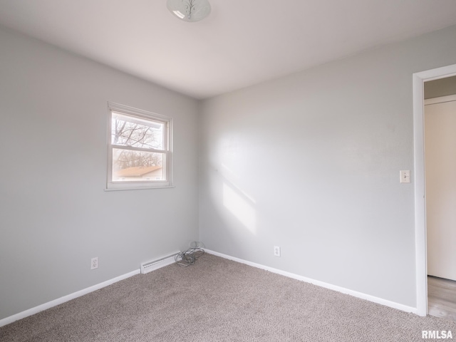 unfurnished room with light carpet