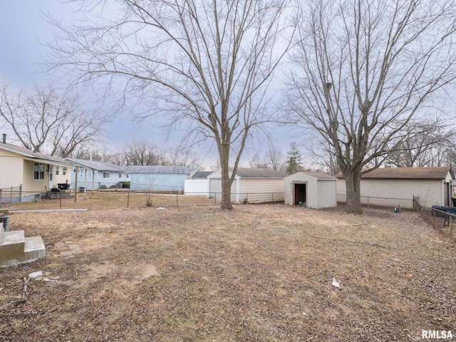 view of yard featuring a storage unit