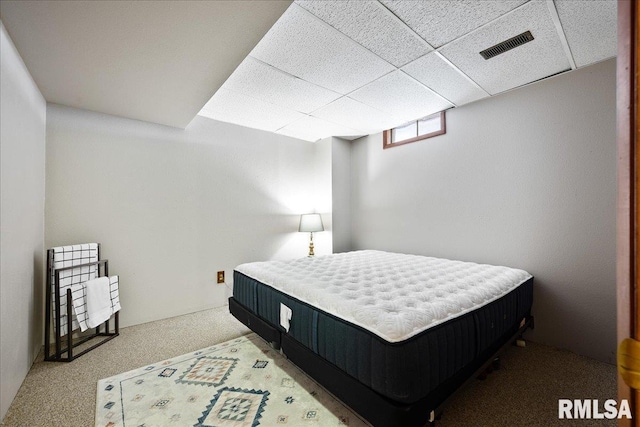 bedroom featuring a drop ceiling