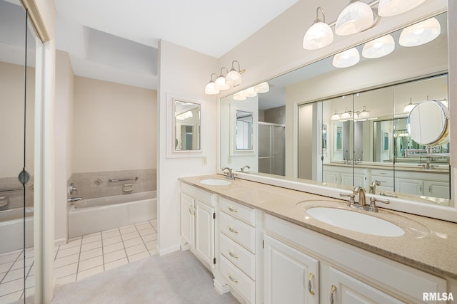 bathroom featuring tile patterned flooring, vanity, and independent shower and bath