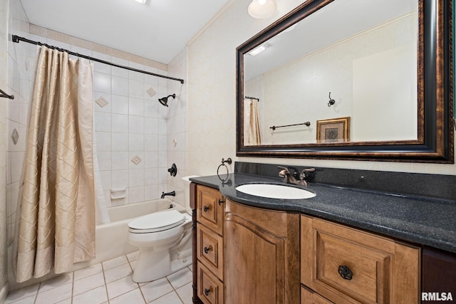 full bathroom featuring tile patterned floors, toilet, vanity, and shower / bath combo