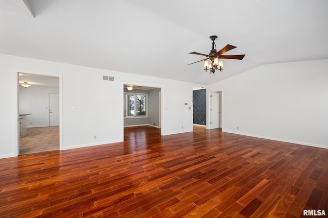 interior space with dark wood-type flooring, ceiling fan, and vaulted ceiling