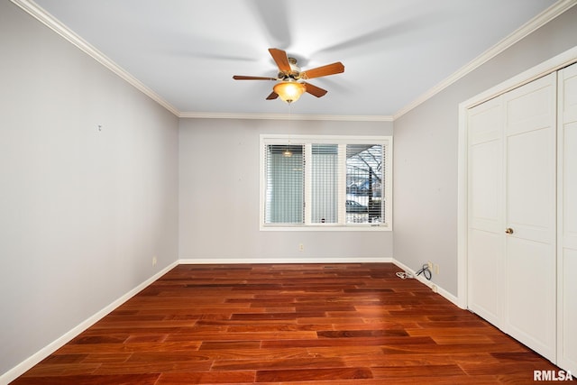 unfurnished bedroom with crown molding, ceiling fan, and dark hardwood / wood-style floors