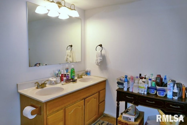 bathroom featuring vanity and a chandelier