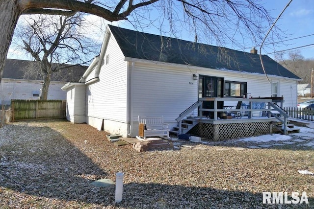 rear view of property with a deck