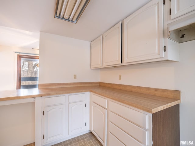 kitchen with white cabinetry