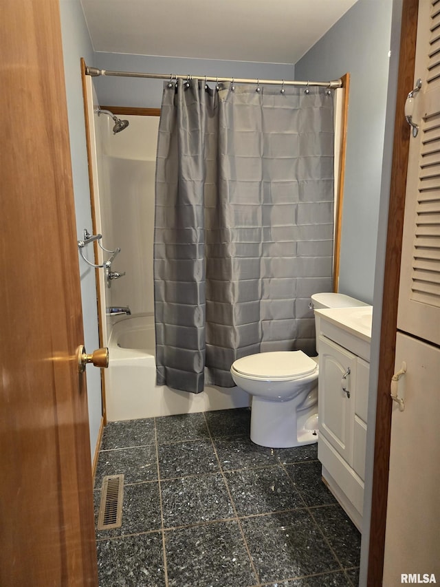 full bathroom featuring shower / bath combination with curtain, vanity, and toilet