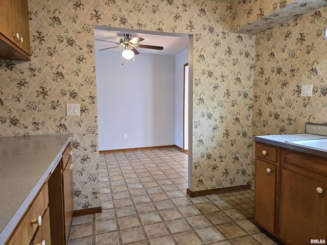 kitchen featuring ceiling fan