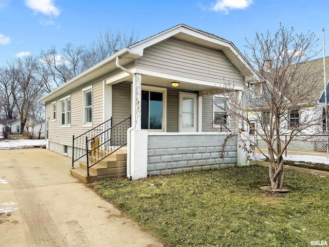 bungalow-style home with covered porch