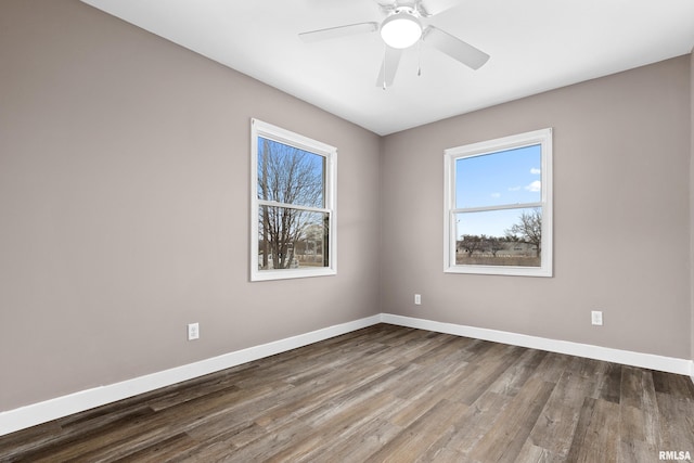 empty room featuring ceiling fan and wood-type flooring