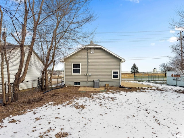 view of snow covered house