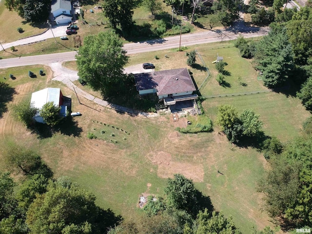 birds eye view of property featuring a rural view