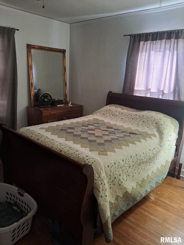 bedroom featuring hardwood / wood-style flooring