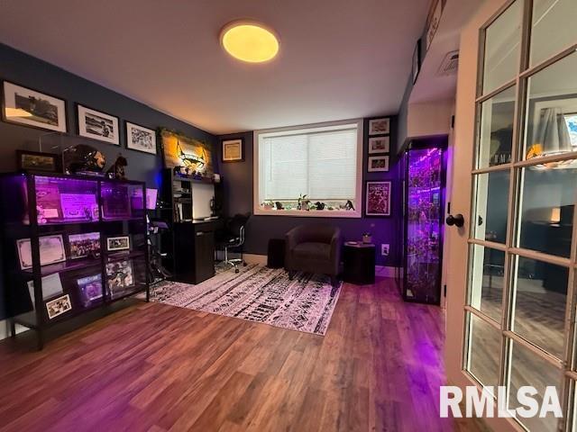 office area with hardwood / wood-style flooring