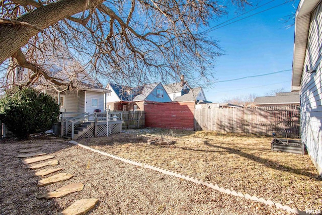 view of yard featuring a wooden deck