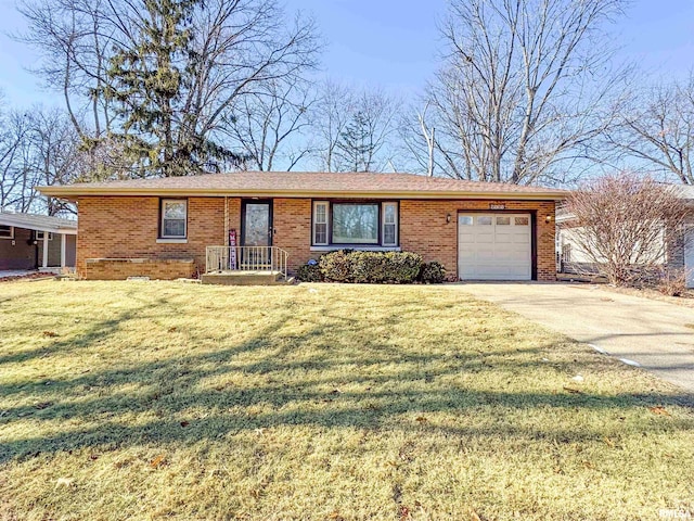 ranch-style house with a garage and a front lawn