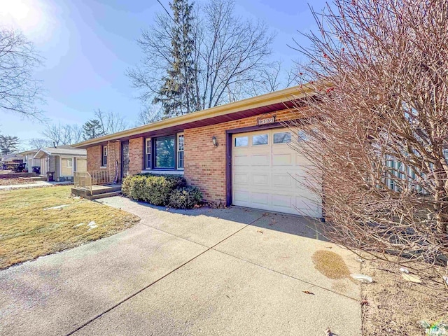 ranch-style house featuring a garage