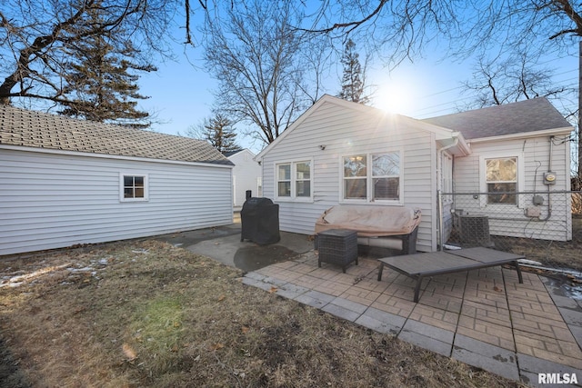 back of property featuring a patio