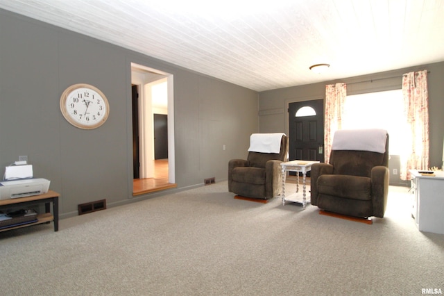 sitting room featuring carpet