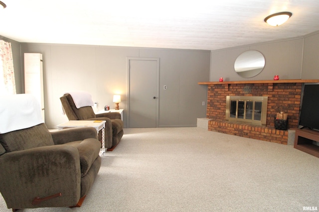 carpeted living room featuring a brick fireplace