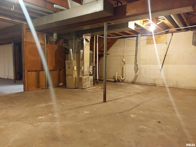 basement featuring heating unit