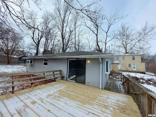 view of snow covered deck