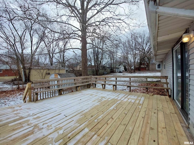 view of snow covered deck