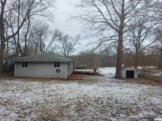 exterior space featuring a shed