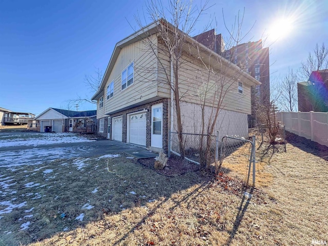 view of property exterior featuring a garage