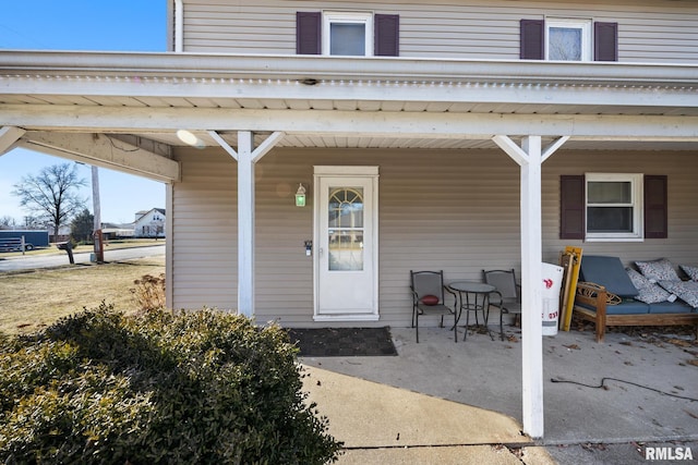 doorway to property featuring a patio