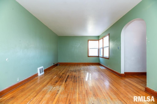 unfurnished room featuring light hardwood / wood-style flooring